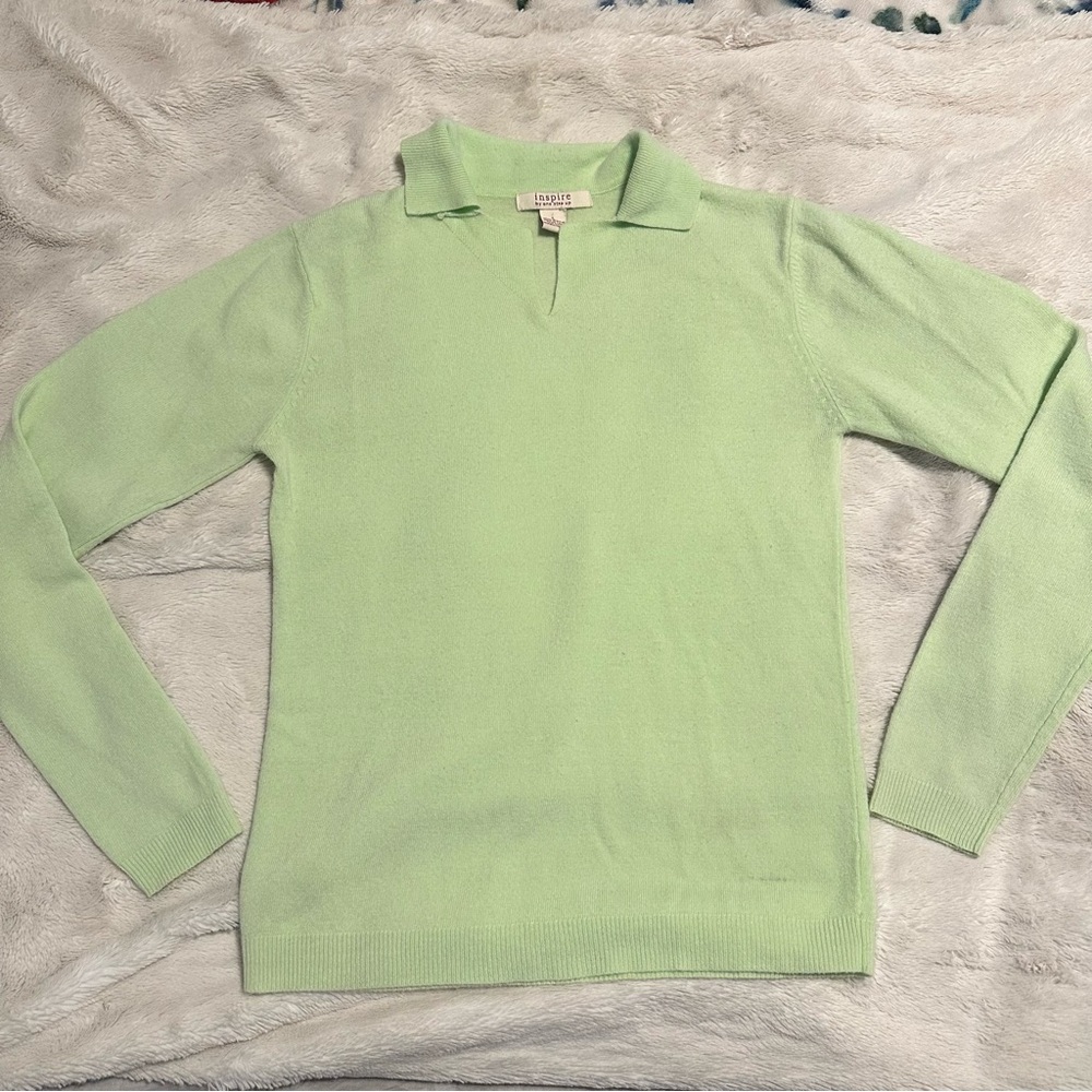 Green collared sweater from the brand "Inspire by One Step Up."